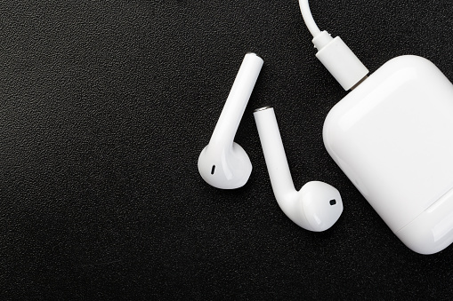 apple-airpods-on-a-white-background-picture-id1204039347